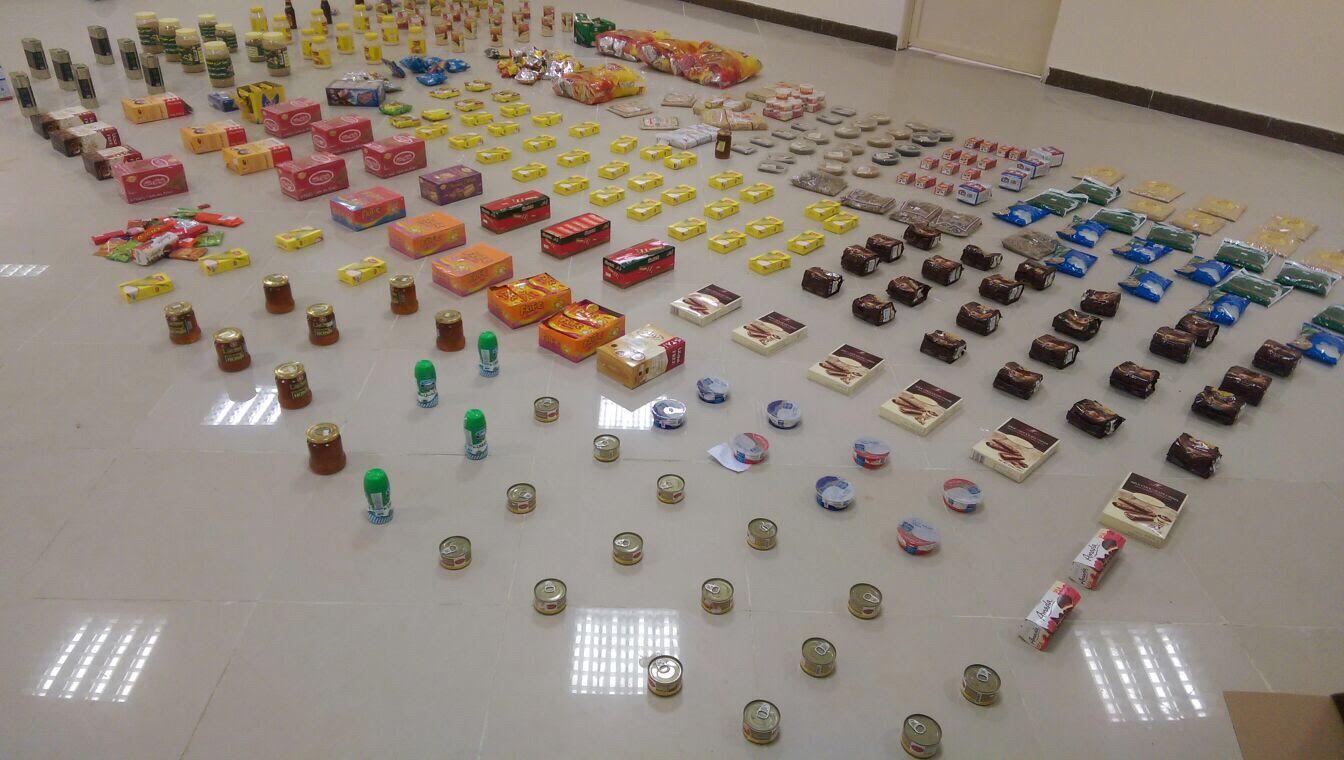 بلدية محافظة المخواة تصادر 100 كيلوا تقريبا  اغذية معلبه وحلويات منتهية الصلاحية بعدد من المحلات التجارية .