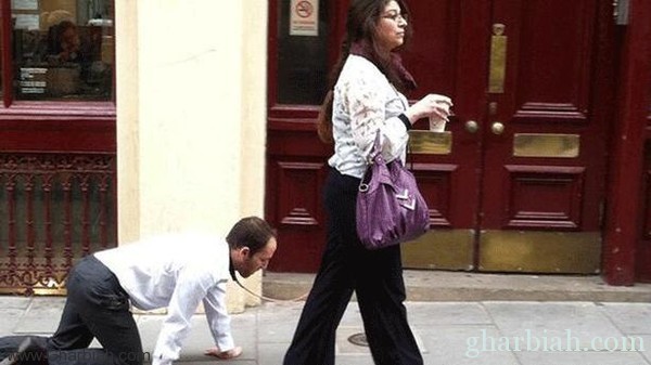 كشف لغز المرأة التي تجر "الرجل الكلب" في شوارع لندن