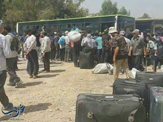 إجلاء 620 مقاتلا مع عائلاتهم من معضمية الشام المحاصرة قرب دمشق