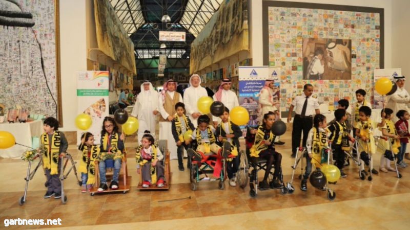 لاعبي الاتحاد يشاركون الاطفال المعاقين فرحتهم باليوم العالمي للاعاقة