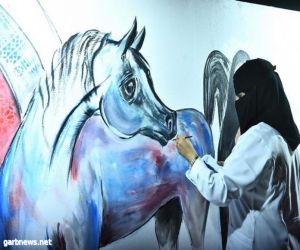 50 رساماً ينهون تصميم أكبر جدارية تشكل اسم "سوق عكاظ"