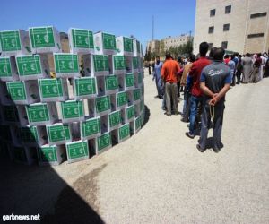 مركز الملك سلمان للإغاثة يوزع 21 طناً من السلال الغذائية الرمضانية على الاشقاء اللاجئين السوريين في محافظة الزرقاء