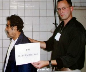 تفاصيل وفاة عميل "FBI " الذي اعتقل صدام حسين وسر احتفاظه بصورة له