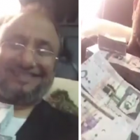 الداعية حسن المالكي يغطي جسده برزم أموال من فئة 500 ريال!"فيديو"